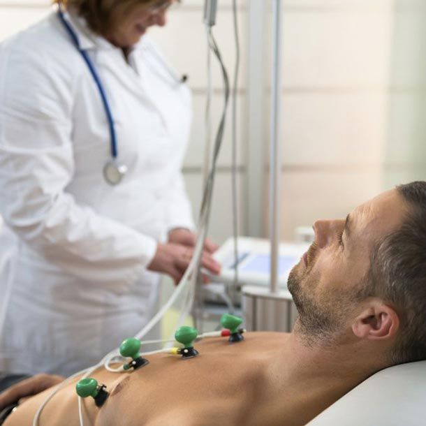 Patient with sensors attached to chest